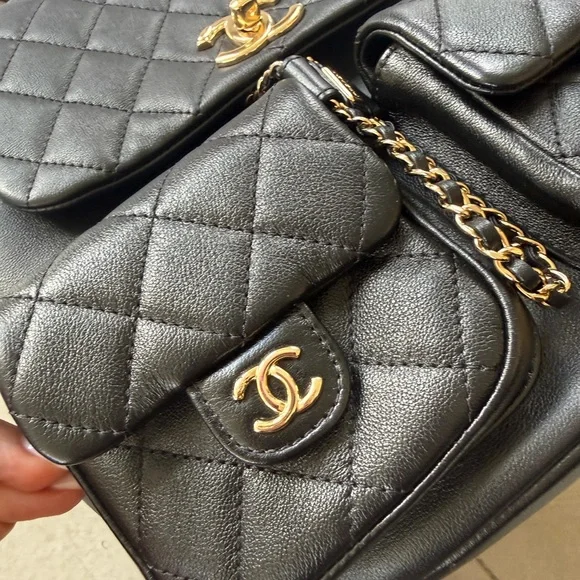 CHANEL Black Quilted Backpack with Gold Accents - Picture 2 of 9